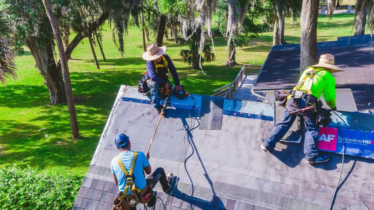 Roofers working on a roof